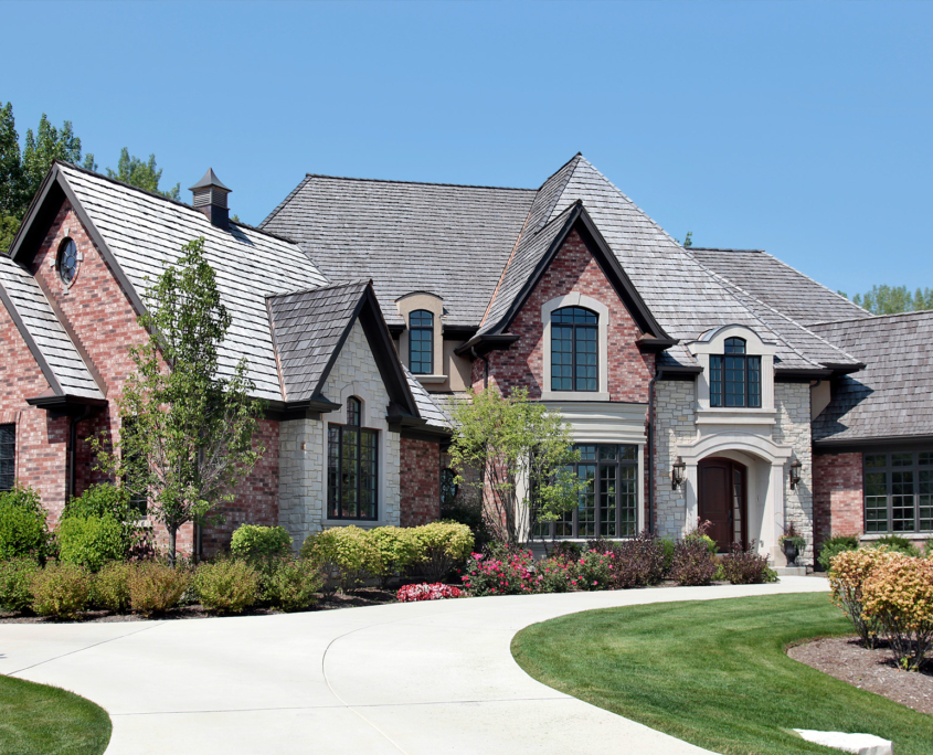 Large brick home with circular driveway